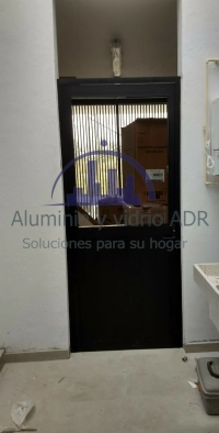 ALUMINIO Y VIDRIO ADR 